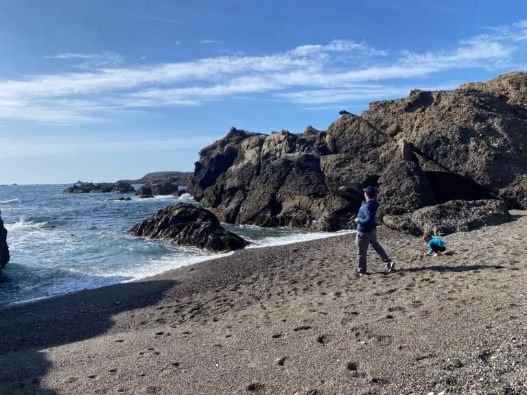 Throwing rocks in Hidden Beach Cove