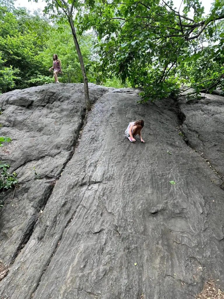 Climbing on rocks in Central Park