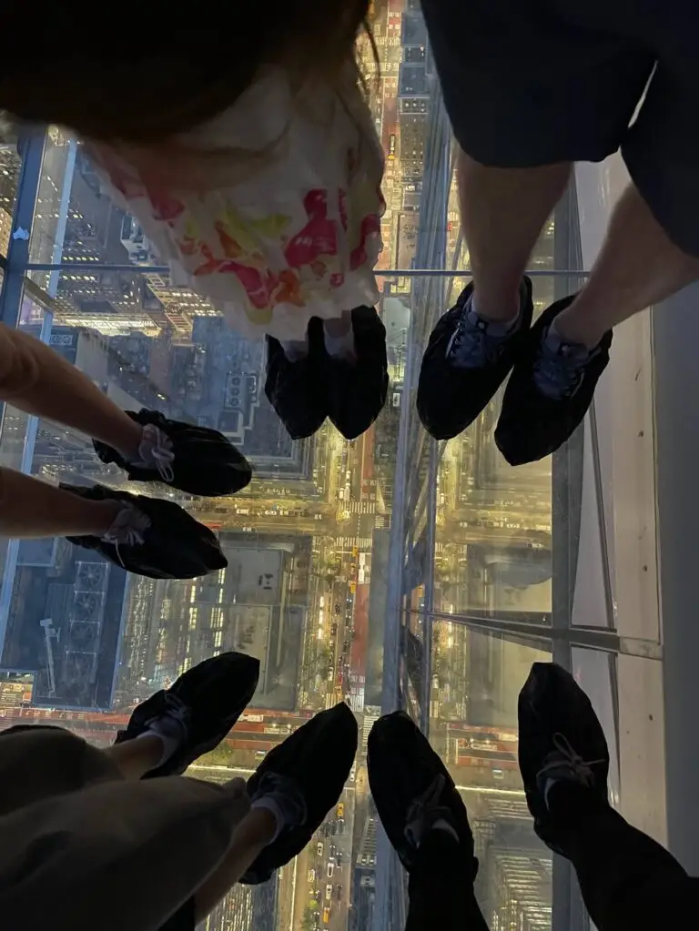Glass bottom floor looking down on the city below at Summit One Vanderbilt