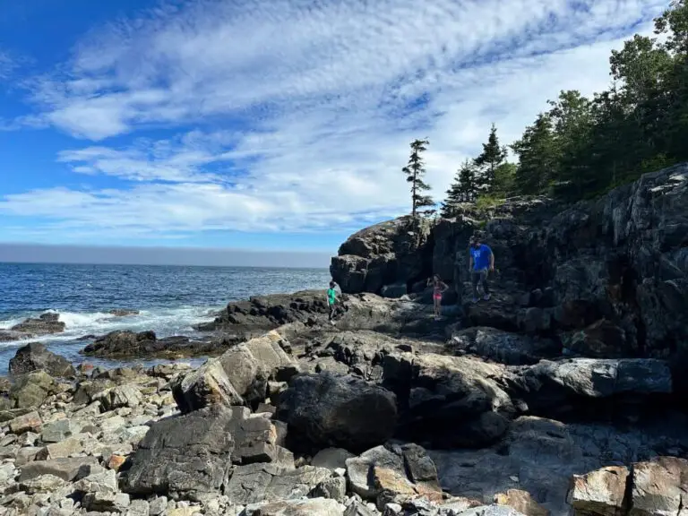Climbing rocks near Schooner Head