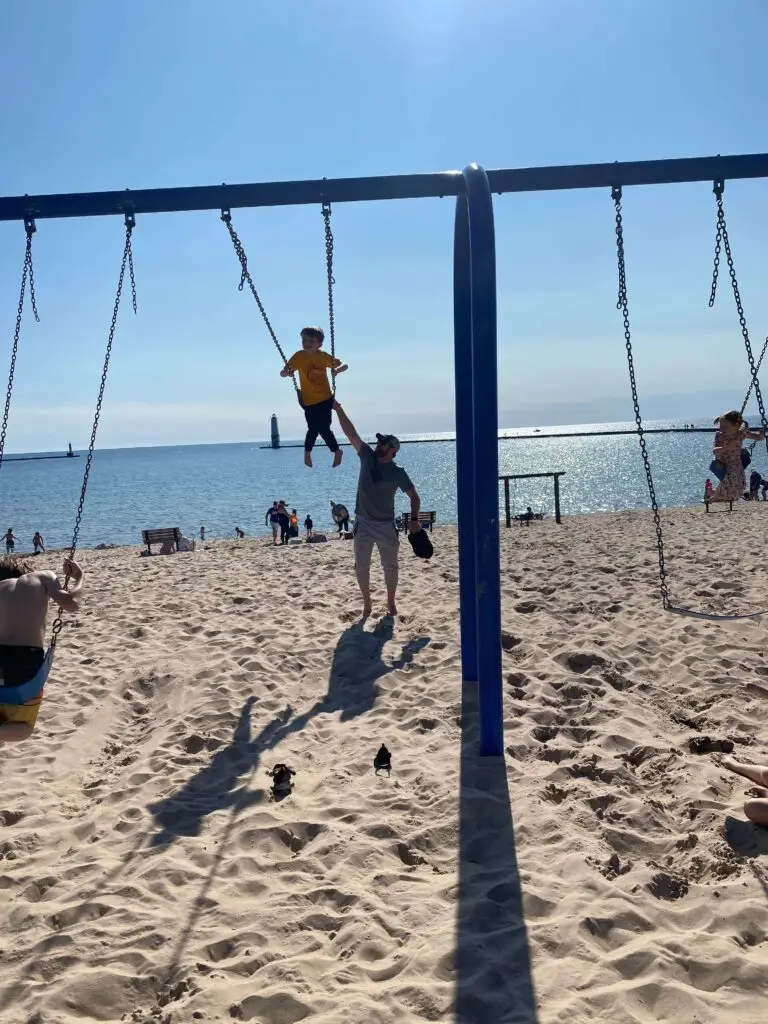 Frankfort Beach has swings!