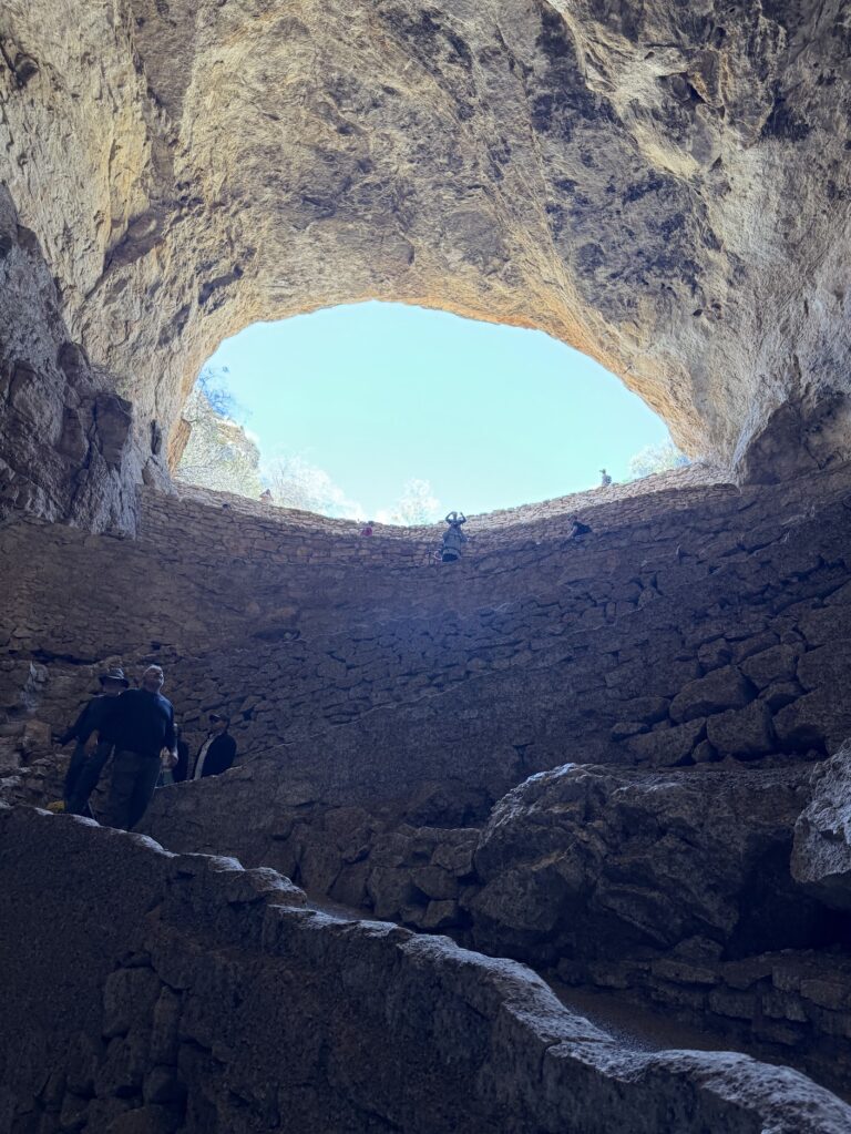 Looking back up at the opening as you descend into the caverns.